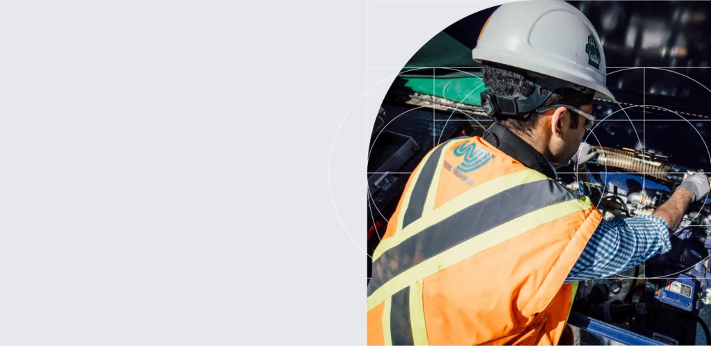 WJ Group worker fixing tubes | Water Management Methods | About Page